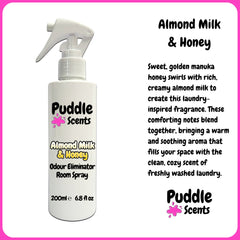 Puddle Scents almond milk and honey room spray bottle with product description text.