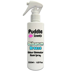 Odour eliminator room spray bottle labeled 'Olibanum Breeze' by Puddle Scents on a white background