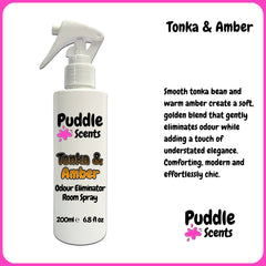 Puddle Scents Tonka & Amber room spray bottle with product description on a white background