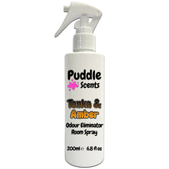 Odour eliminator room spray bottle labeled 'Puddle Scents Tonka & Amber' on a white background